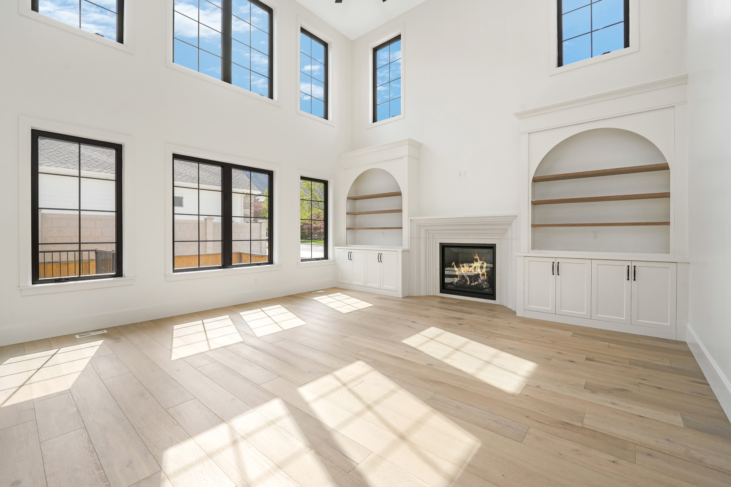 Two-story great room with tall windows